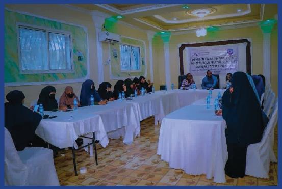Participants seated around a meeting table during a stakeholder session