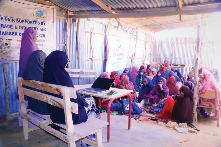 Women attending a community trade fair